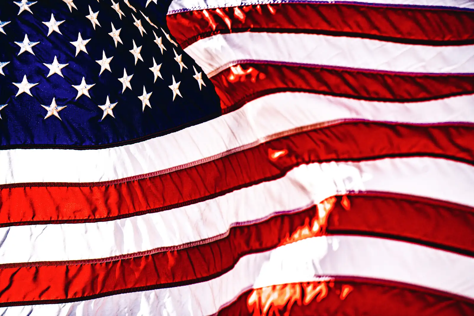 The American flag waving in the wind