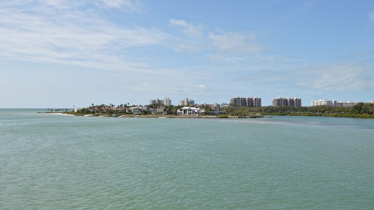 Longboat Key shoreline with condominium towers and homes across the water