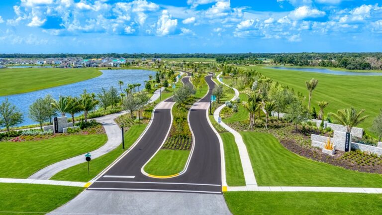 Entrance boulevard with Firethorn monument signs and lakes at Firethorn, Parrish, Florida