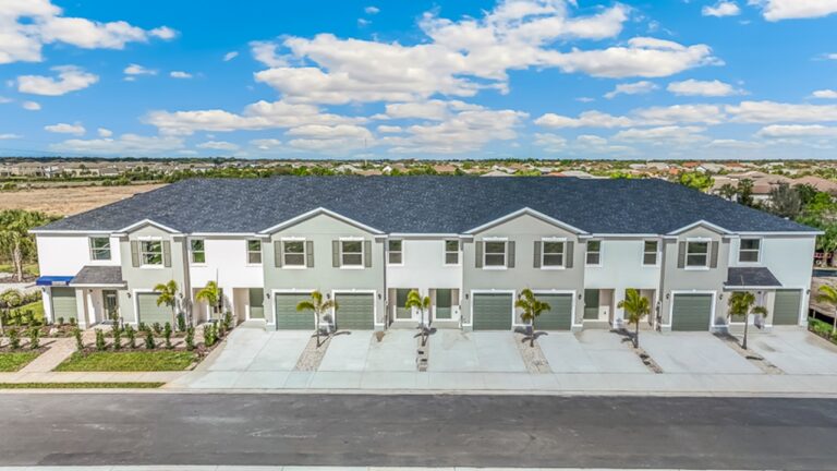 Row of new two-story townhomes at The Gardens at Bay Street, Sarasota, Florida