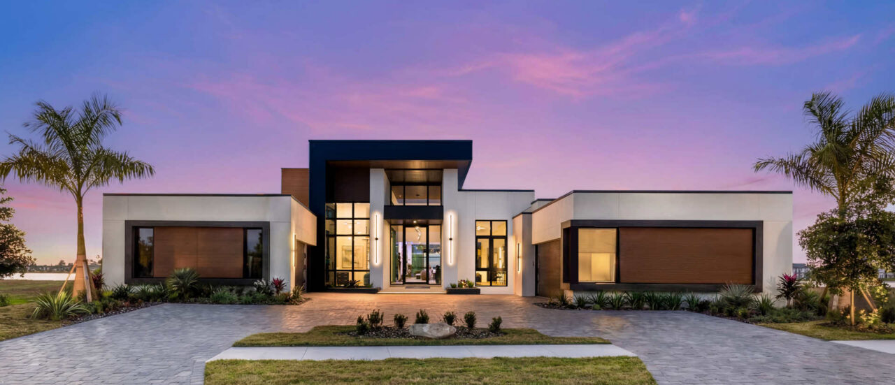 The Oulina model home at dusk at Kingfisher Estates, Lakewood Ranch, Florida