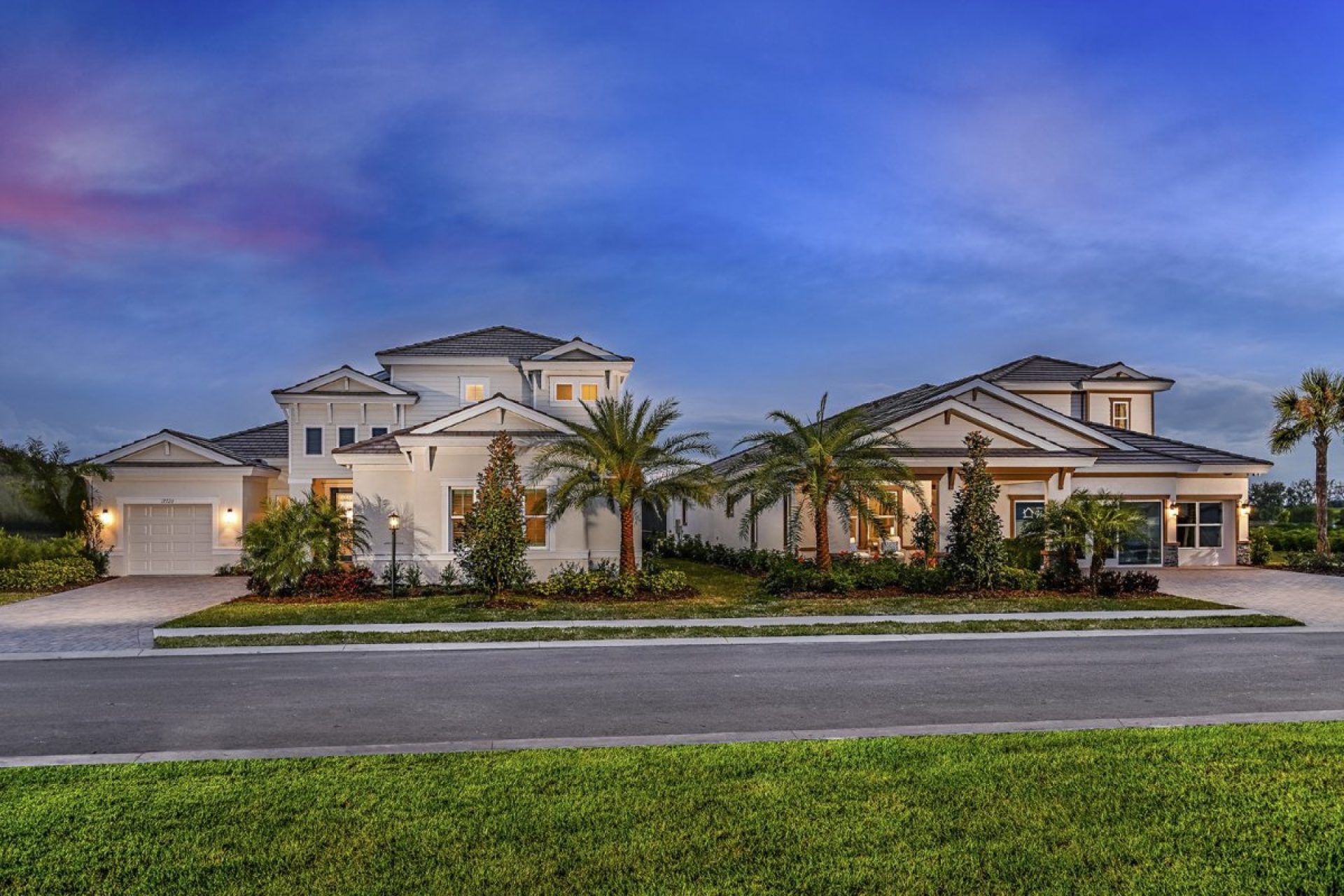 Streetscape of new homes at dusk at Star Farms at Lakewood Ranch, Florida