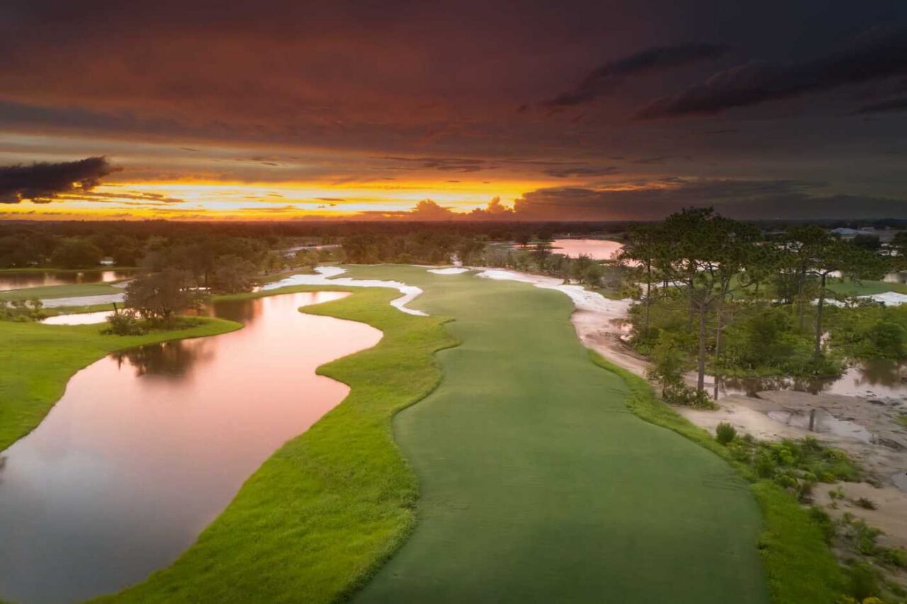 Golf fairway and lake at sunset at Soleta Golf Club, Myakka City, Florida