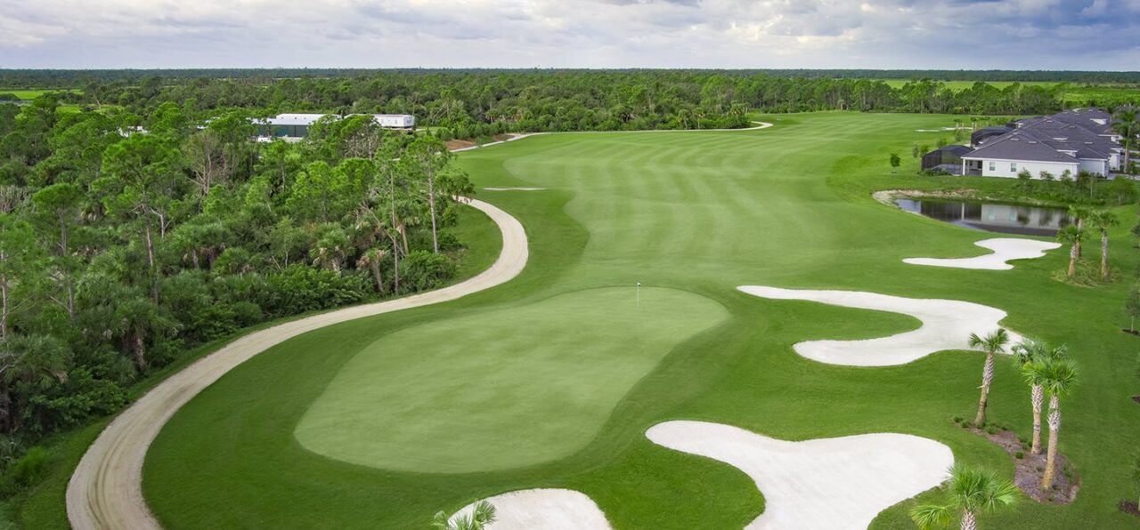Golf course green and fairway with homes at Wellen Park Golf & Country Club, Venice, Florida