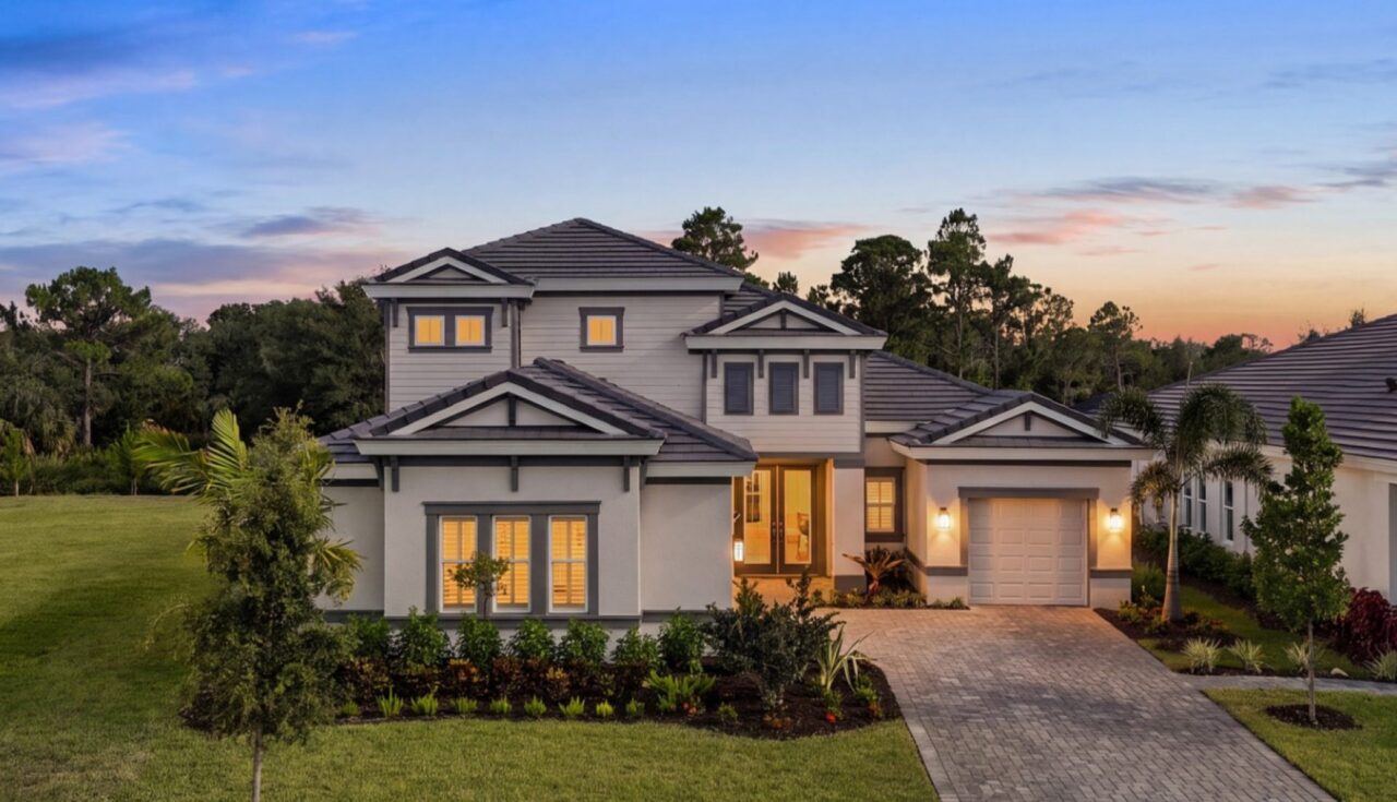 Siesta Key II model home at dusk at Longleaf at Grand Park, Sarasota, Florida