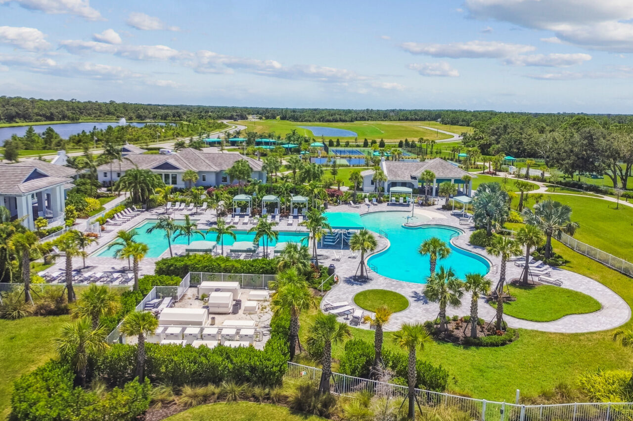 Aerial view of the pools, clubhouse and tennis courts at Grand Park, Sarasota, Florida