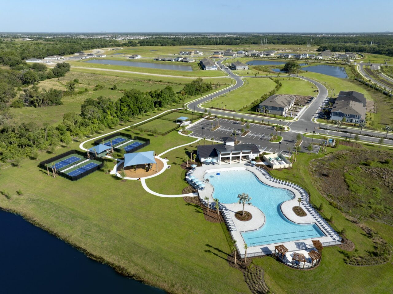 Aerial view of the clubhouse, pool and pickleball courts at Crosswind Ranch, Parrish, Florida