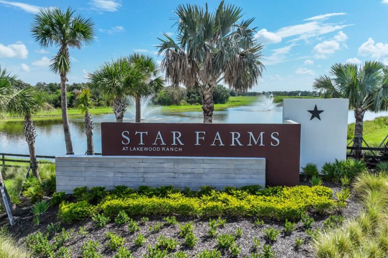 Star Farms at Lakewood Ranch entrance monument with lake and fountains at Star Farms at Lakewood Ranch, Lakewood Ranch, Florida