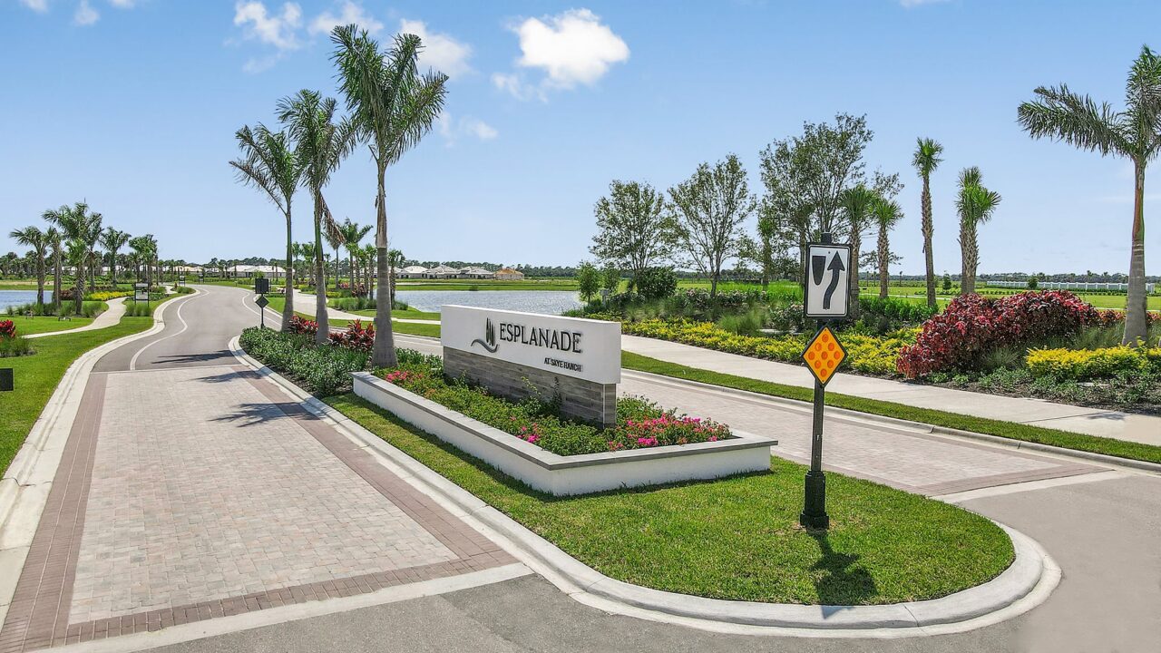 Esplanade monument sign and landscaped entry drive at Esplanade at Skye Ranch, Sarasota, Florida