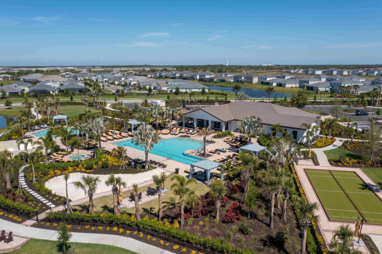 Aerial view of a resort pool campus and clubhouse at Star Farms, Lakewood Ranch, Florida