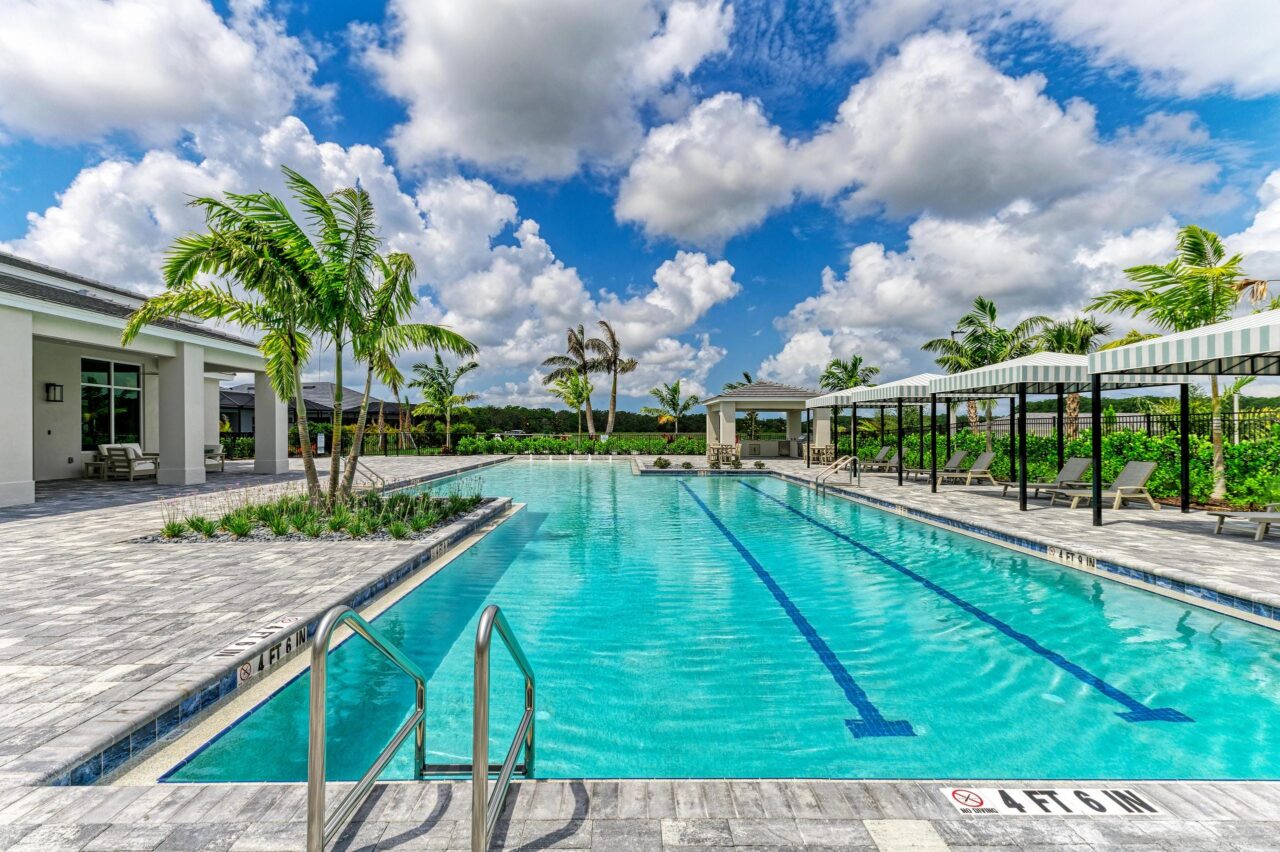 Resort pool and cabanas at the amenity center at Artisan at Watercolor Place, Bradenton, Florida
