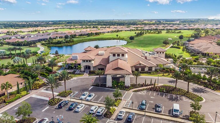 Aerial view of the Culinary Center clubhouse, lake and golf course at Esplanade Golf and Country Club at Lakewood Ranch, Lakewood Ranch, Florida