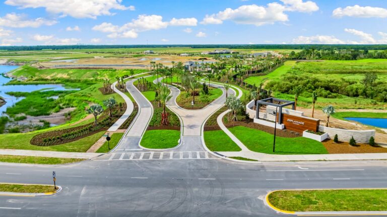 Aerial view of the Esplanade entry sign and boulevard at Esplanade at Coasterra, Palmetto, Florida