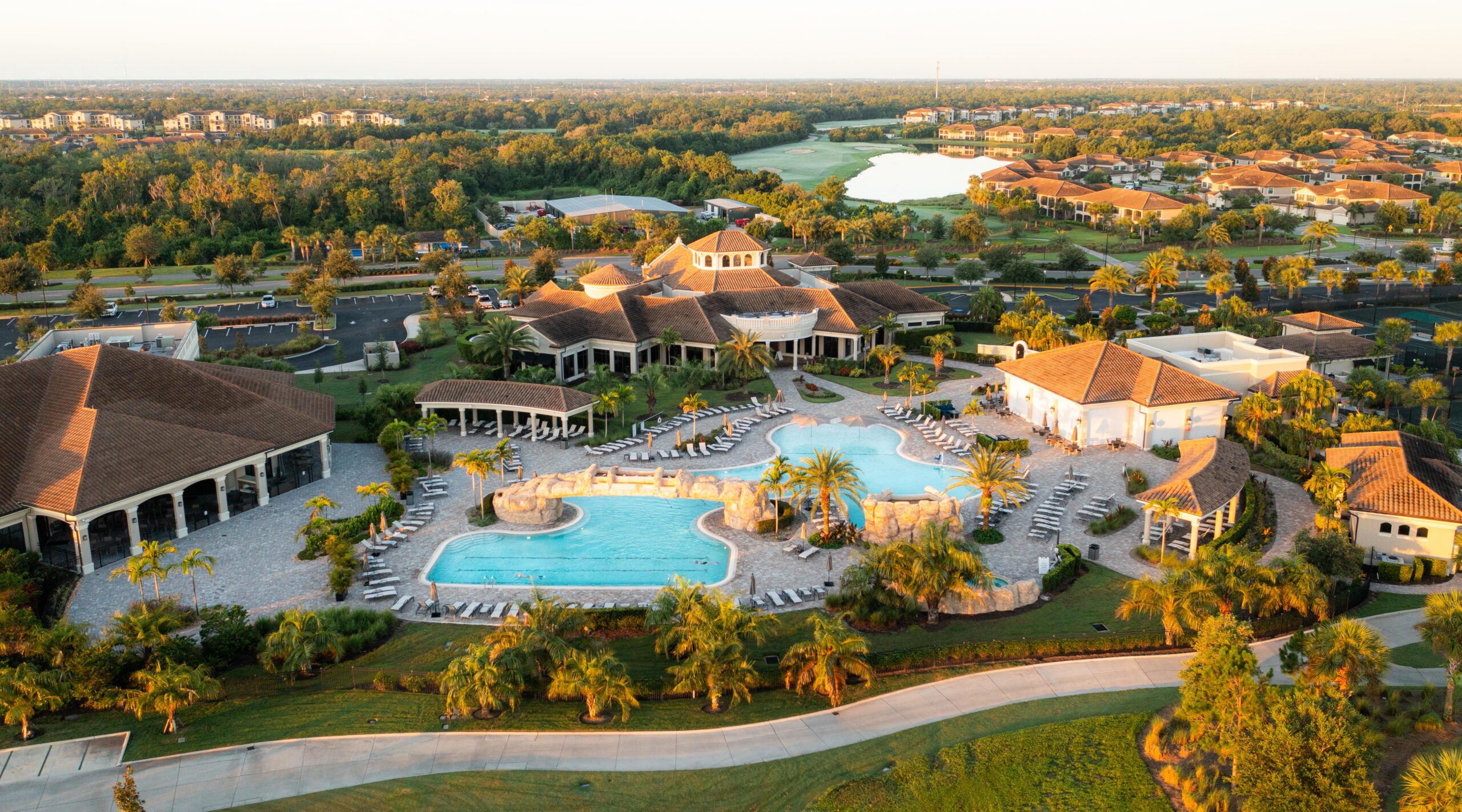 Aerial view of the clubhouse, resort pool and golf course at Lakewood National at Lakewood Ranch