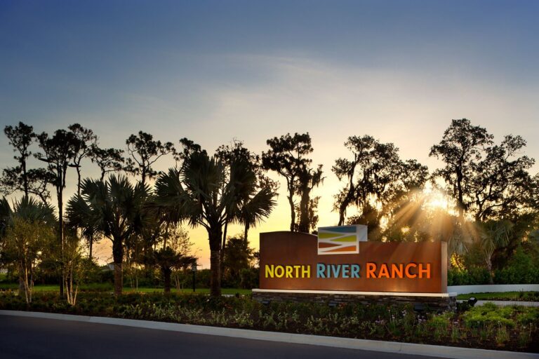 North River Ranch entrance monument sign at sunset at North River Ranch, Parrish, Florida