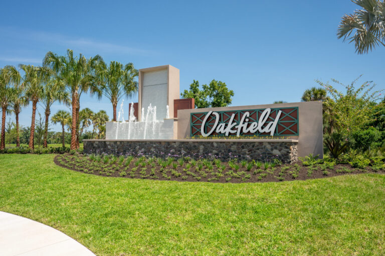 Oakfield entrance monument sign with fountain at Oakfield, Parrish, Florida