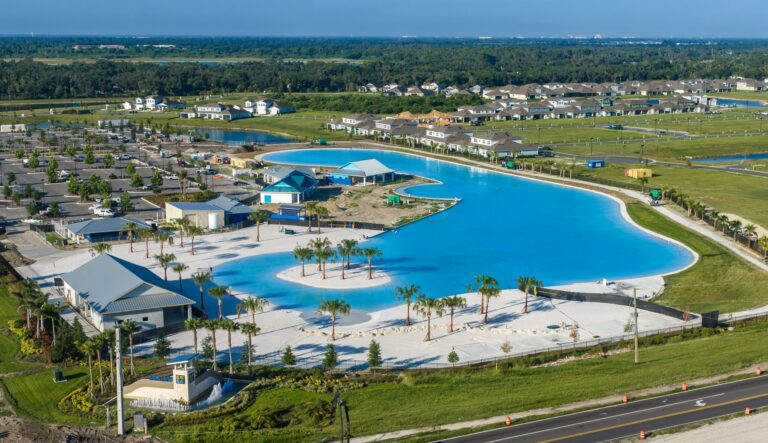 Aerial of the lagoon, beach and entrance sign at Seaire, Parrish, Florida