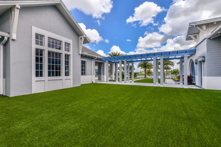 Clubhouse and pergola walkway beside the event lawn at Solstice at Wellen Park, Venice, Florida