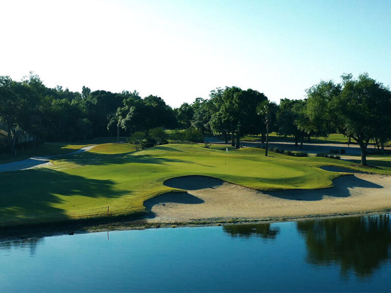 Golf green, bunkers and lake at Tara Golf & Country Club, Bradenton, Florida