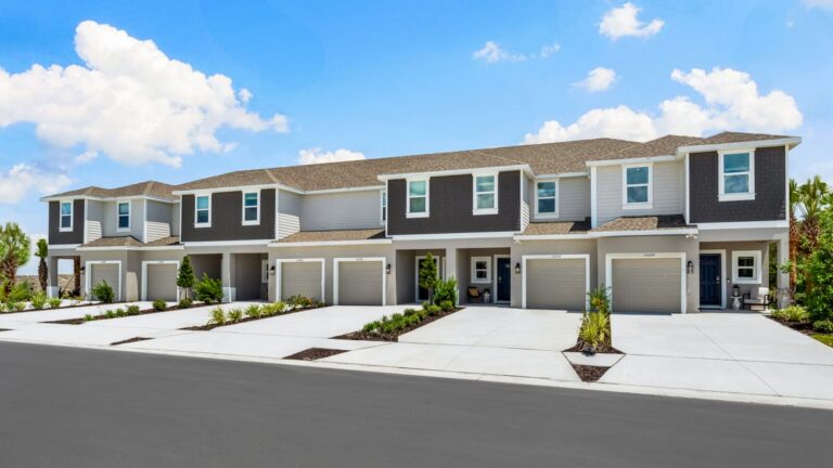Model townhome row exterior at The Towns at Firethorn, Parrish, Florida