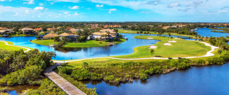 Aerial view of the golf course, lakes and homes along the Manatee River at Waterlefe Golf & River Club, Bradenton, Florida
