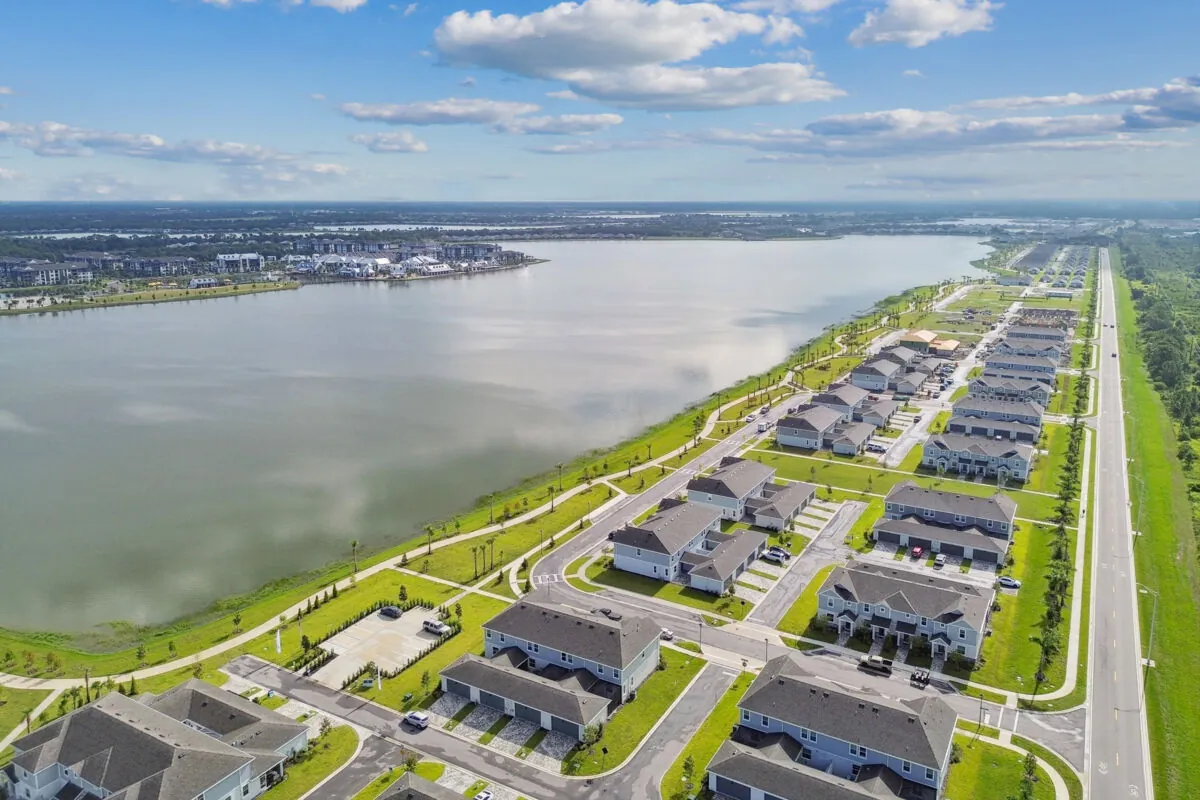 Aerial view of the Nautique at Waterside townhomes beside Kingfisher Lake
